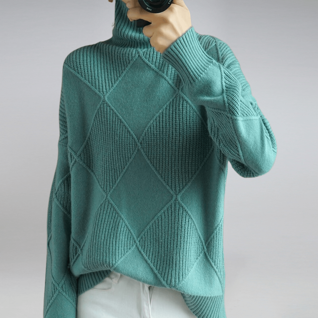 Maglione invernale da donna, dolcevita morbido ed elegante, un capo di moda essenziale per la stagione fredda.