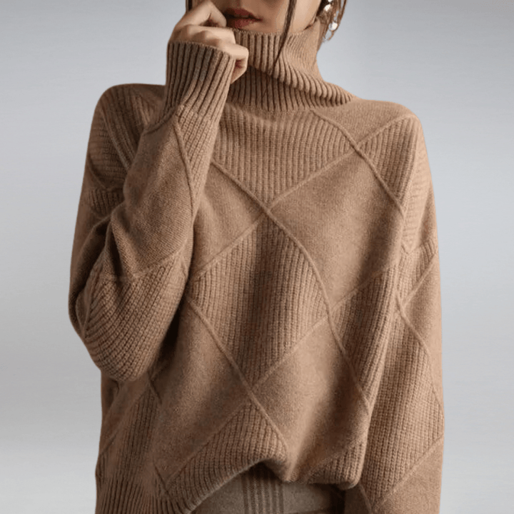 Pullover dolcevita donna in maglia morbida, perfetto per outfit casual o di moda, sinonimo di comfort.