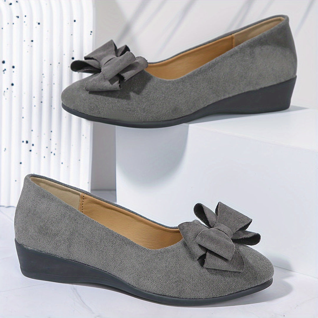 Ballerine nere donna, comfort e stile con fiocco delicato e suola imbottita.