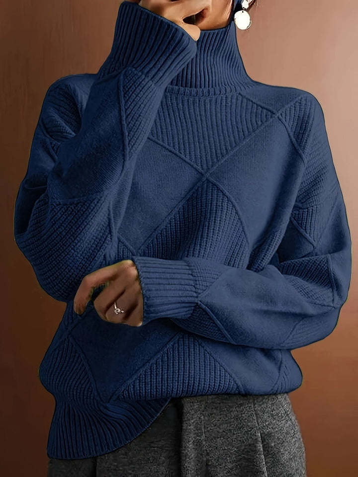 Maglione collo alto donna elegante e caldo, perfetto per comfort e stile autunno/inverno.