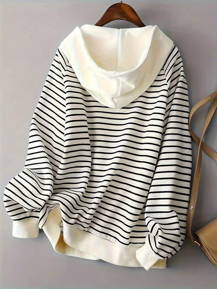 Giubbotto donna beige con cappuccio, leggero e confortevole. Perfetto per il clima autunnale e lo stile casual.