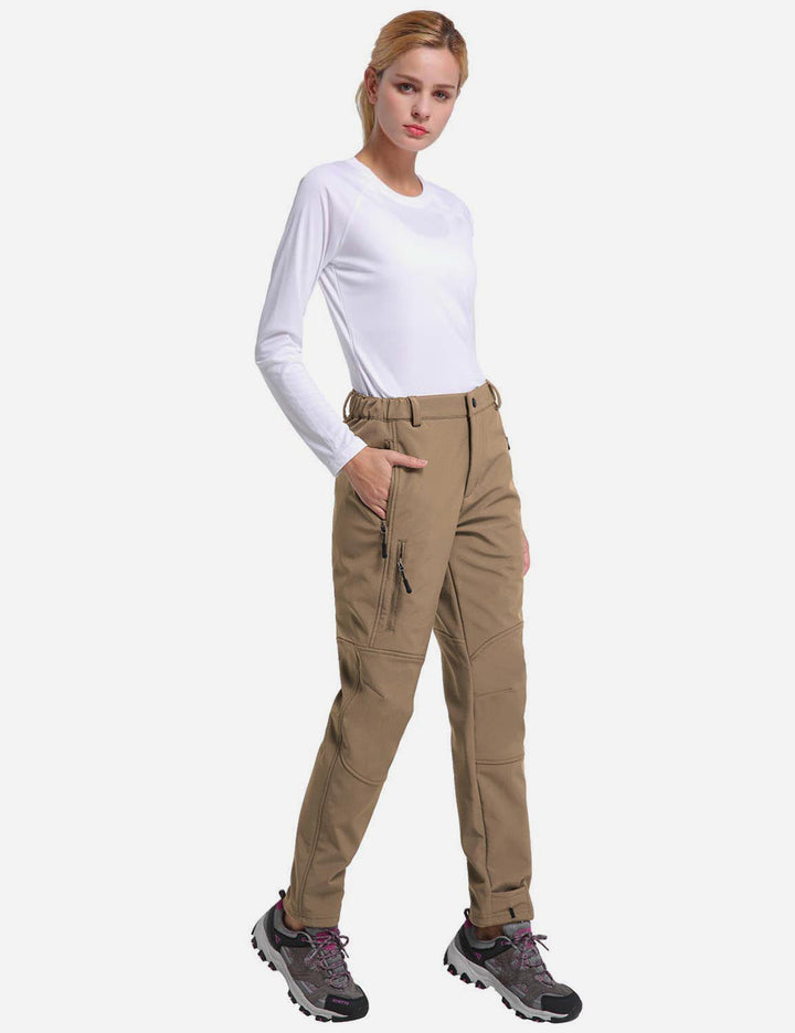 Pantaloni outdoor donna con tasche zip, caldi, termici e resistenti.