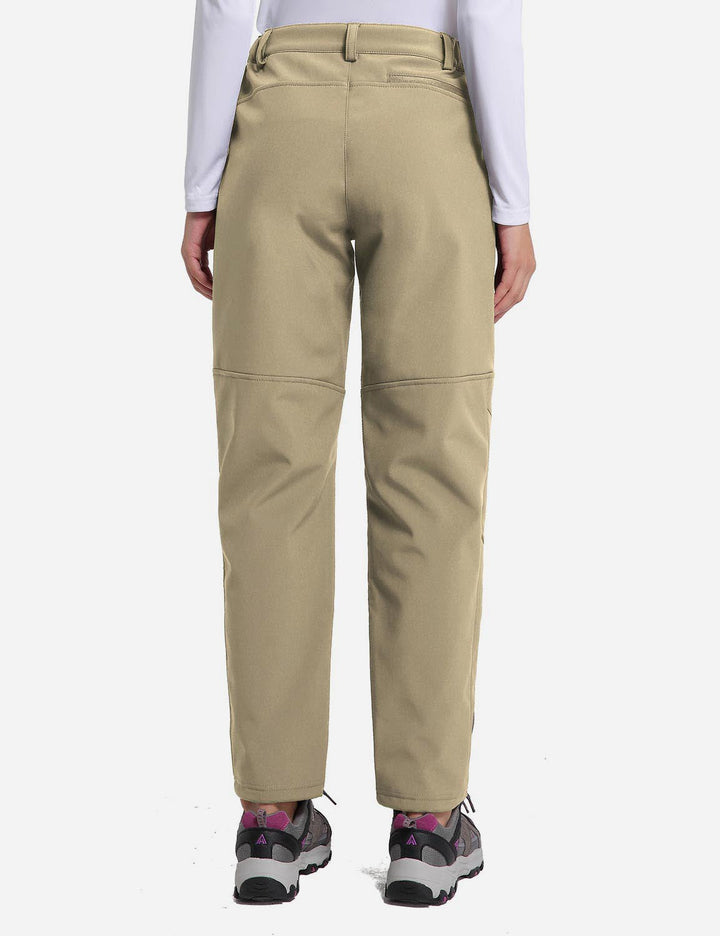 Pantaloni sportivi termici donna per trekking in montagna, con tasche zip.