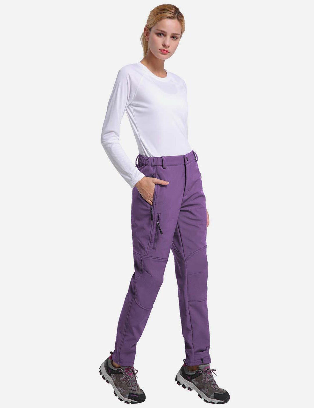 Donna, pantaloni invernali termici con tasche zip, ideali per sport outdoor.