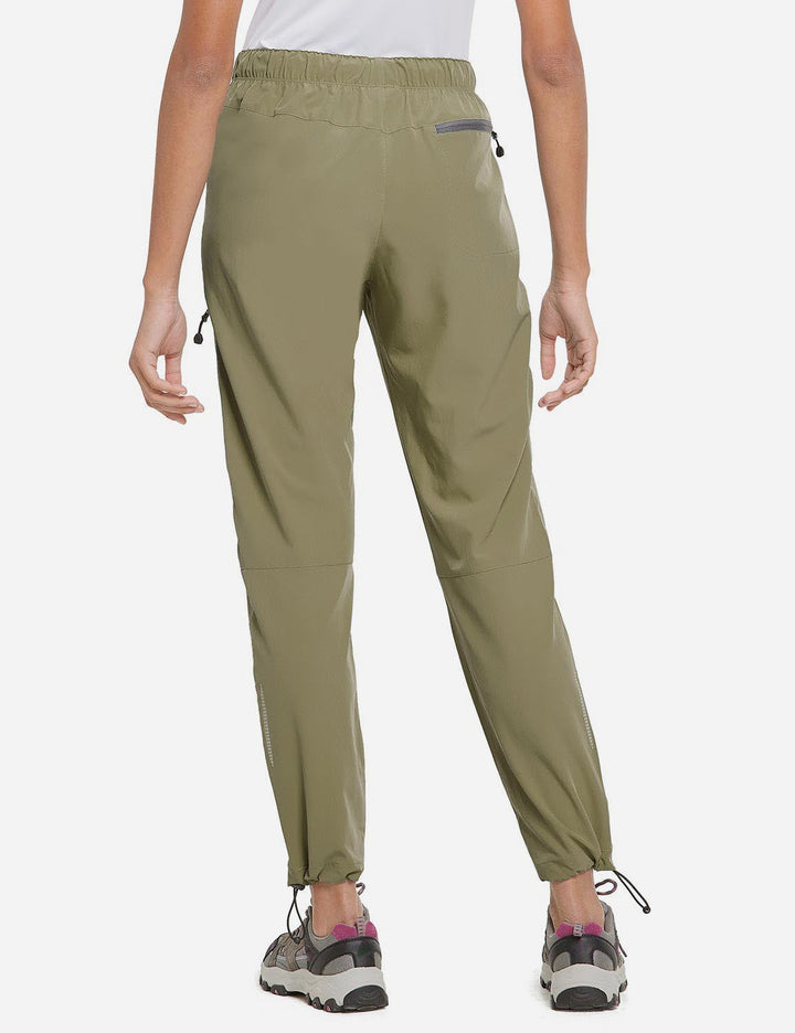 Pantaloni trekking donna regolabili, con pratiche tasche con cerniera.