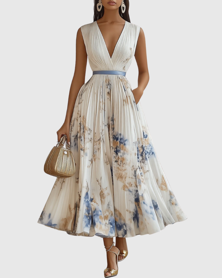 Abito lungo fluido donna con scollo V e cintura, ideale per invitate a matrimoni estivi o primaverili.