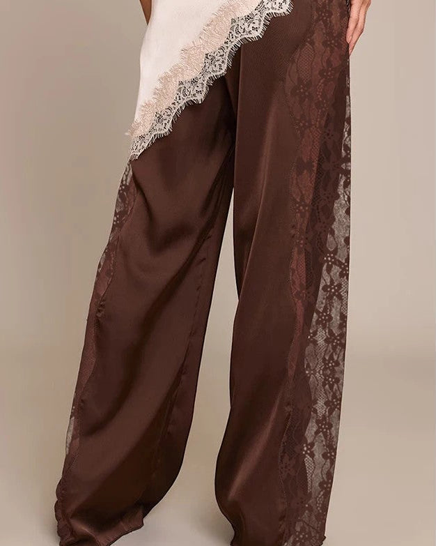 Pantaloni donna eleganti vita alta con pizzo e gamba dritta, perfetti per outfit da sera o eventi chic.