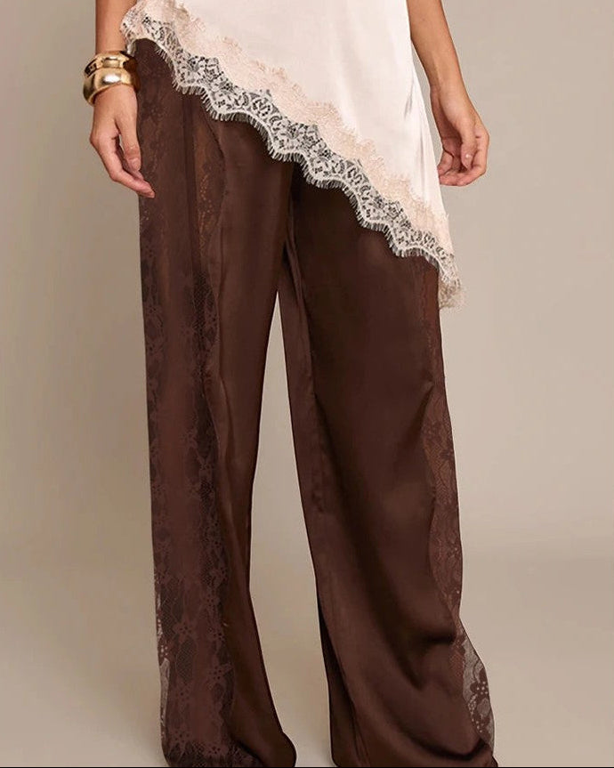 Pantaloni donna neri a vita alta con dettagli in pizzo e gamba dritta, versatili per ogni occasione elegante.