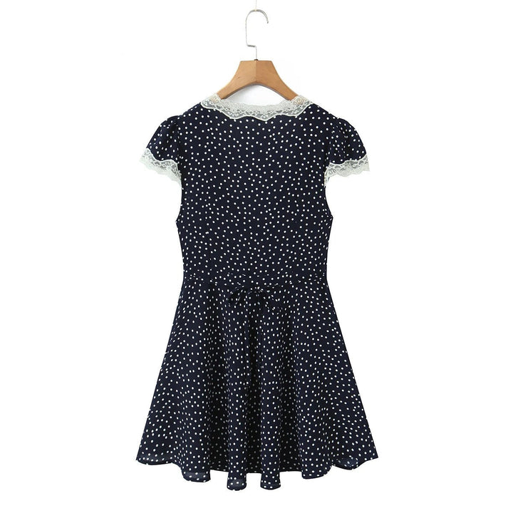 Abito midi donna estivo a pois con scollo a V, cintura regolabile. Perfetto per look casual chic o eleganti.