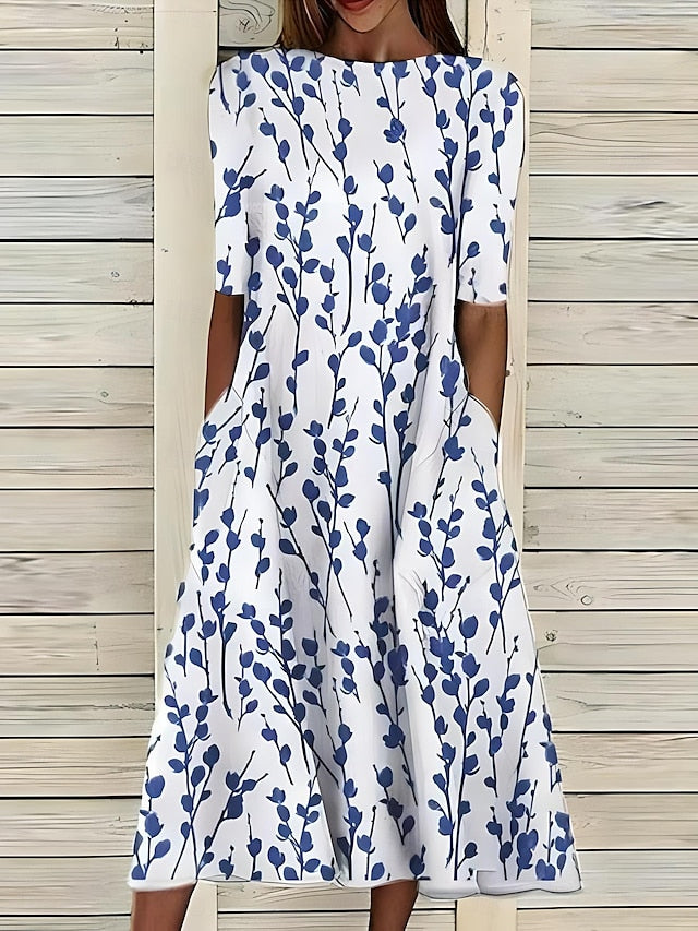 Vestito estivo midi floreale da donna con scollo rotondo e maniche corte, perfetto per la moda mare.