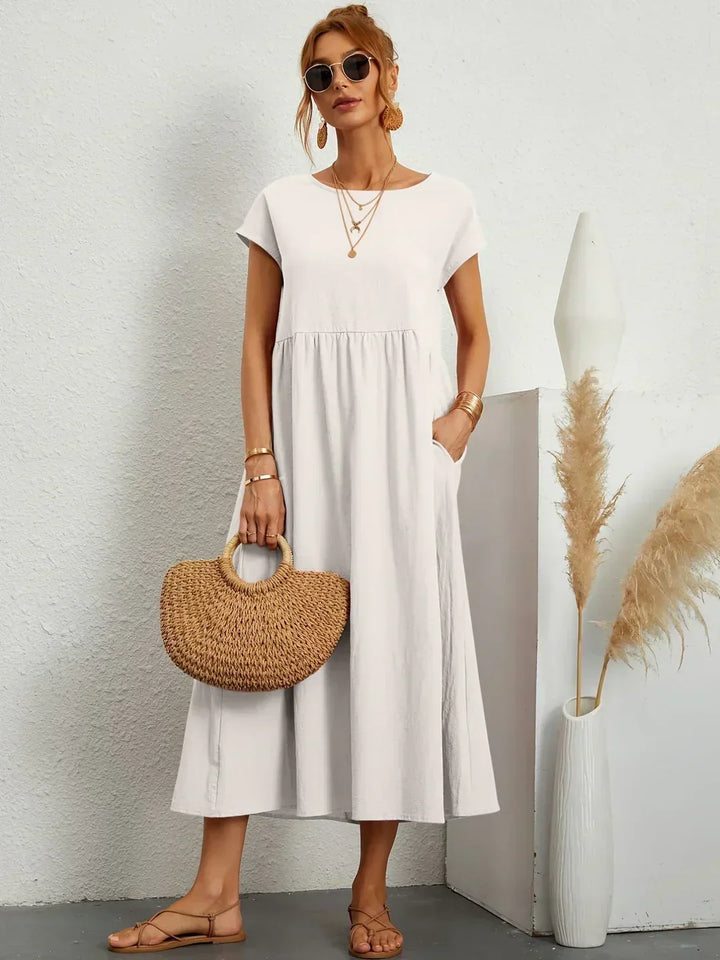 Abito midi donna autunnale, maniche kimono, comodo e chic. Perfetto per l'abbigliamento quotidiano.