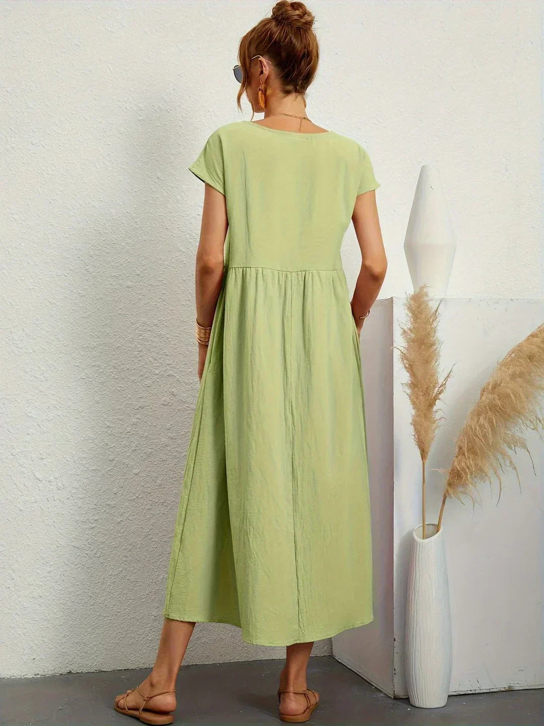 Abito midi donna comodo per l'autunno, maniche kimono, elegante e versatile per ogni figura.