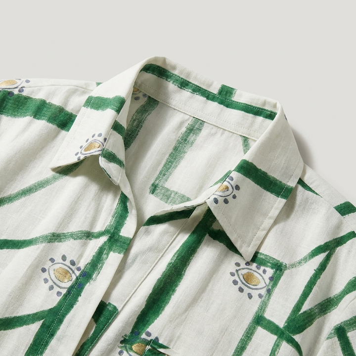 Camicia oversize donna e shorts abbinati con vivace stampa geometrica, perfetto per l'estate.