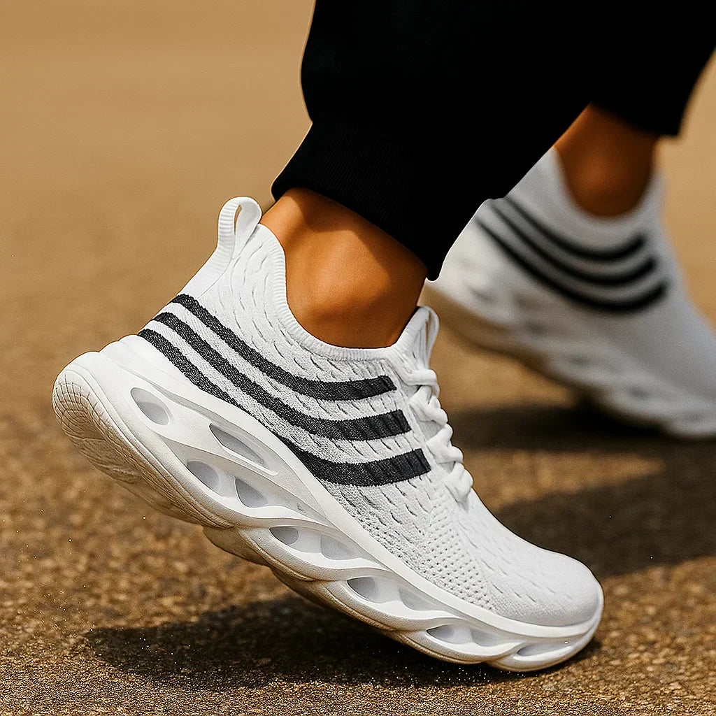 Scarpe uomo con innovativa suola StickTread per massima aderenza in corsa e allenamento.