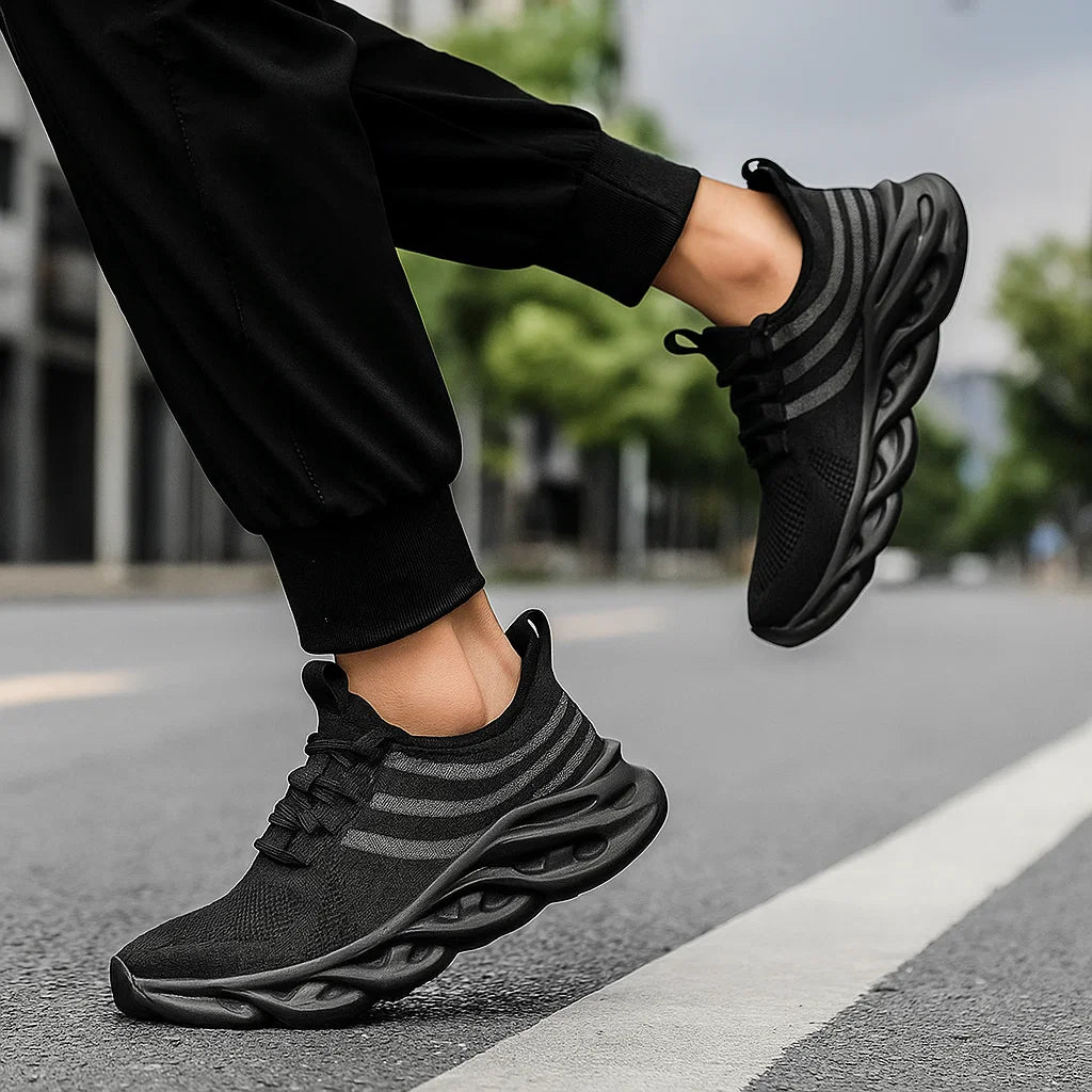 Scarpe leggere uomo per corsa e allenamento, suola StickTread, design moderno e comfort.