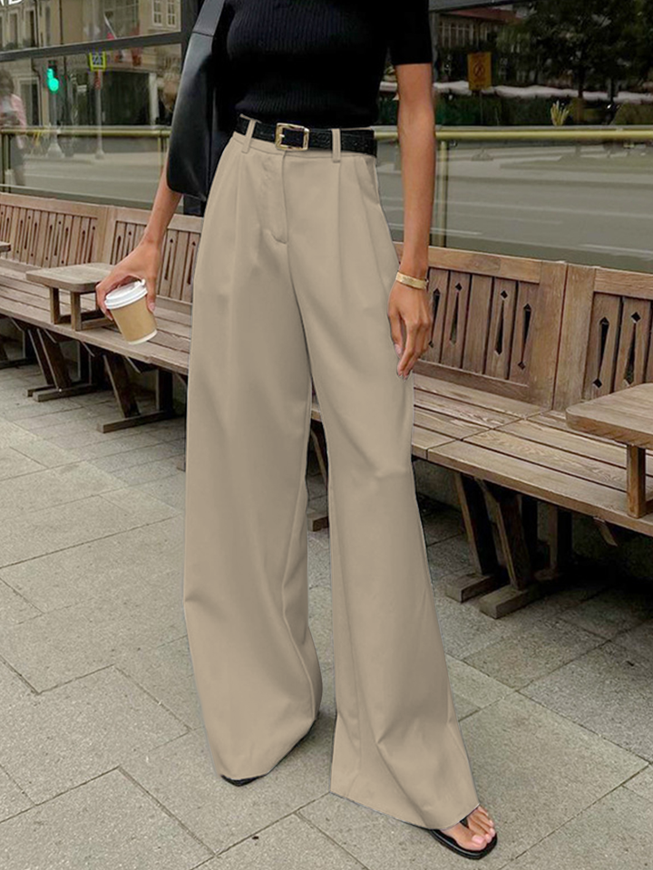 Pantaloni eleganti da donna gamba larga, modello palazzo, vita alta, per look da ufficio.