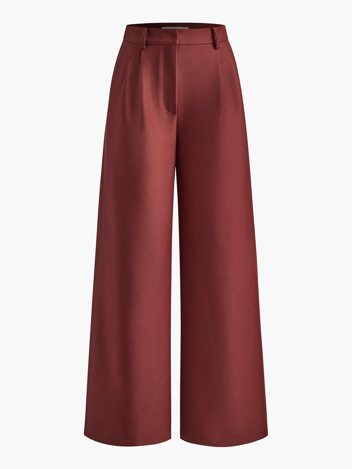 Abbigliamento donna: pantaloni palazzo a vita alta, gamba ampia, perfetti per l'estate.