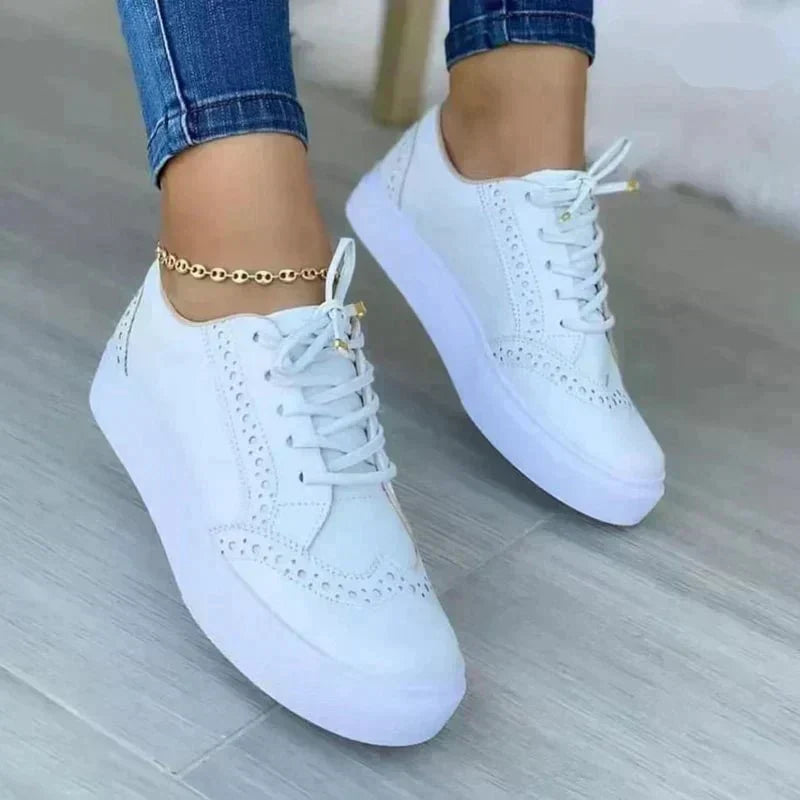 Sneakers comode da donna con supporto plantare avanzato, ideali per lunghe passeggiate e attività.