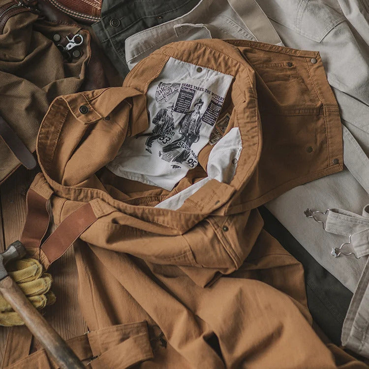 Tuta unisex stile vintage robusta e confortevole, perfetta per artigiani e uso quotidiano.