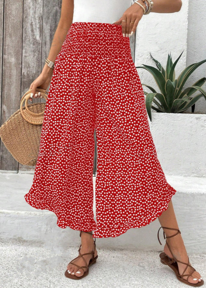 Pantaloni donna eleganti a gamba larga e vita alta con stampa a pois. Perfetti per outfit primavera estate casual.