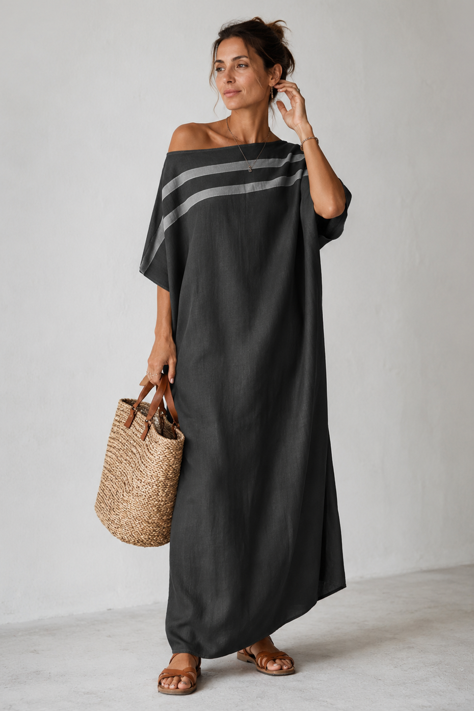 Abito maxi fluido donna per vacanze o casual chic. Vestito lungo leggero e confortevole, ideale per outfit estivi.