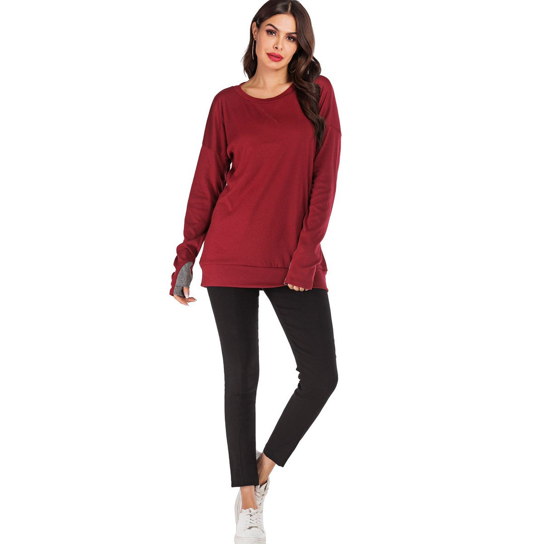 Maglione femminile a tinta unita con scollo rotondo, vestibilità comoda e rilassata.