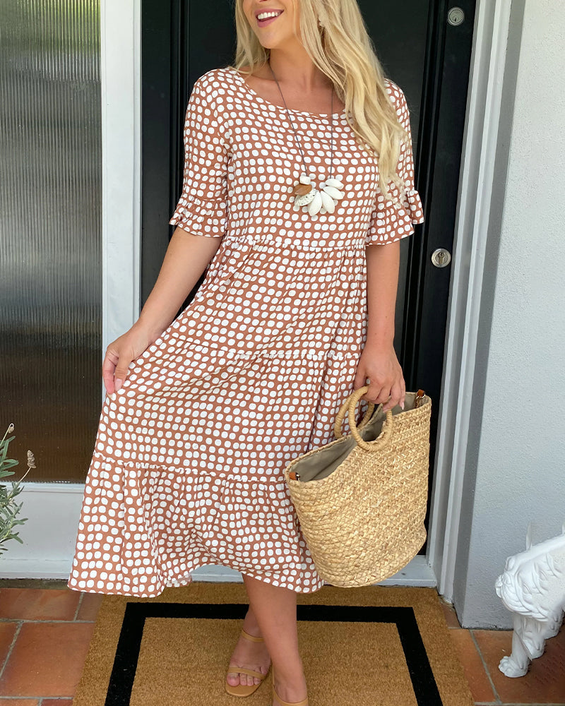 Elegante abito midi donna a pois, stile estivo, scollo rotondo, perfetto per ogni occasione.