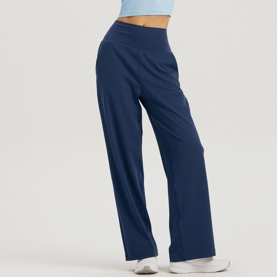 Pantaloni yoga donna vita alta e gamba ampia. Progettati per comfort flessibile durante sport, fitness e relax.
