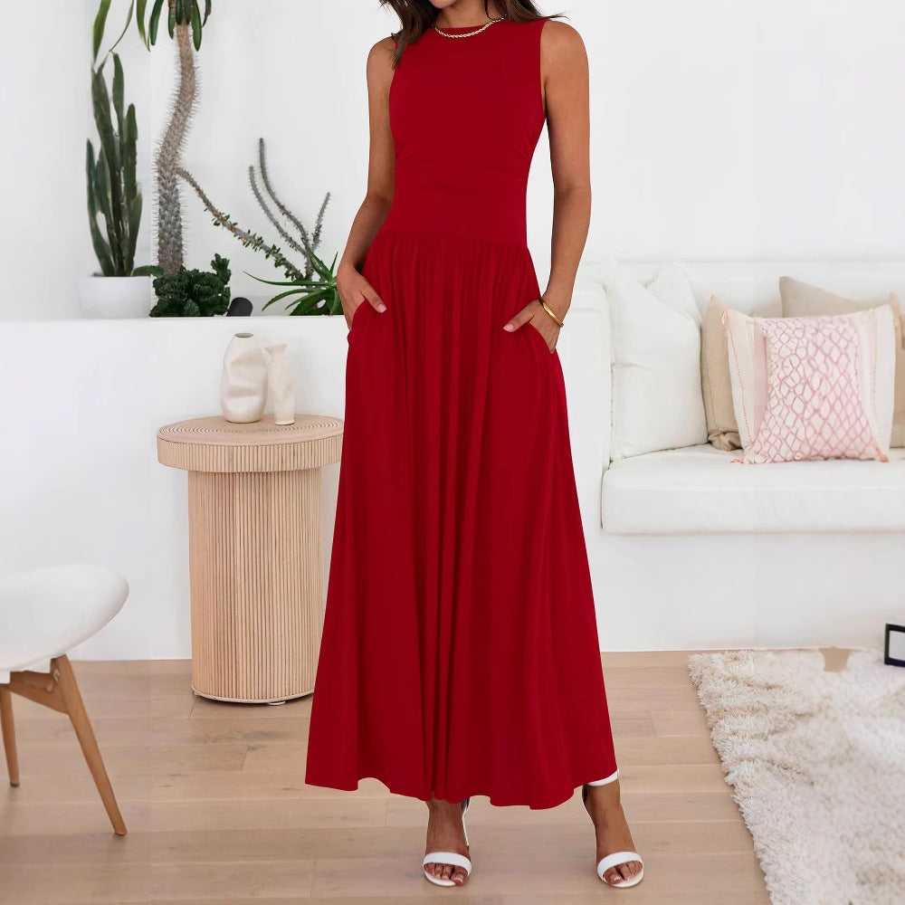 Abito lungo fluido da donna con tasche per un look elegante e confortevole. Perfetto per ogni giorno.