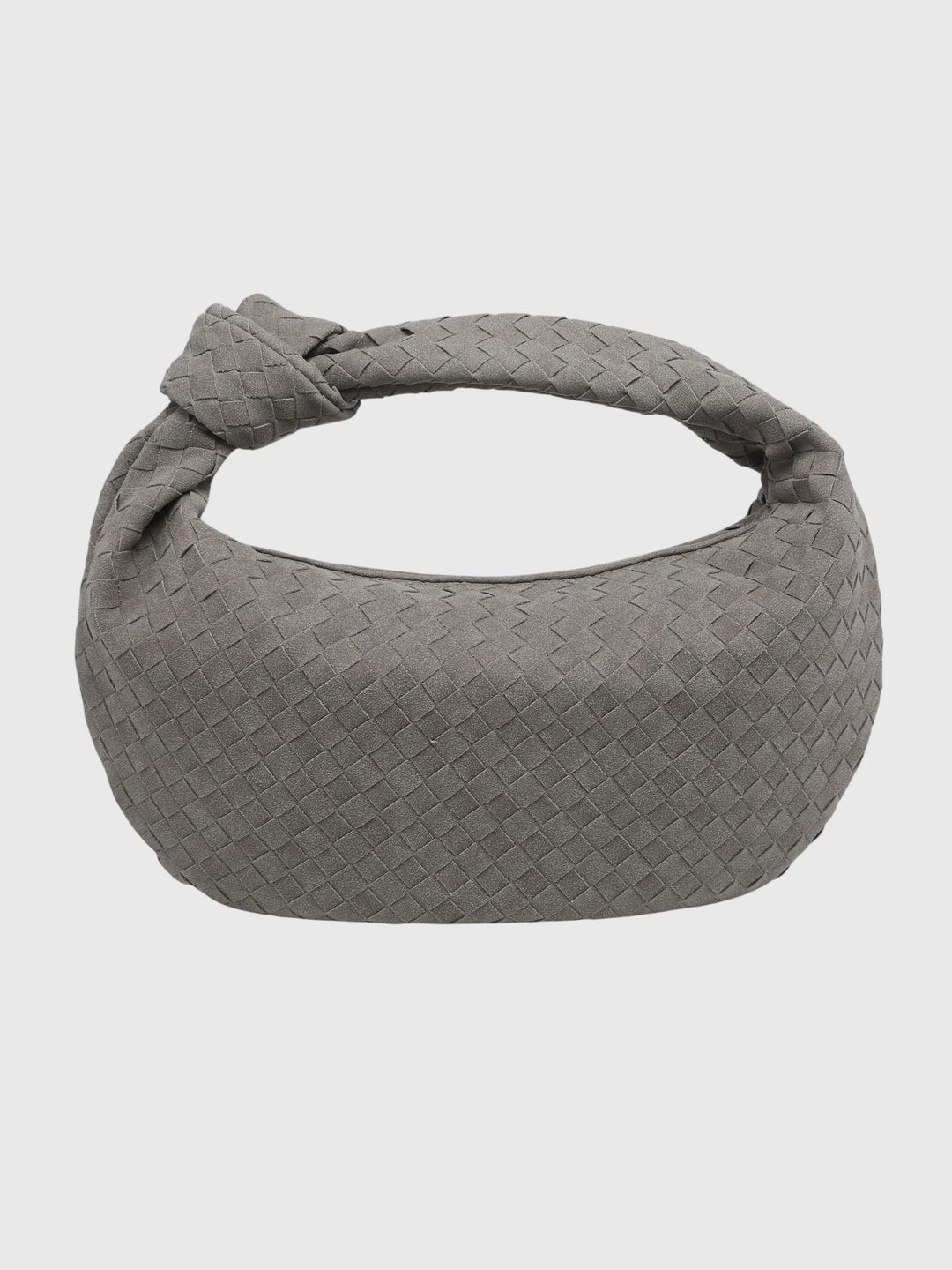 Borsa donna media in suede intrecciato color cammello con nodo decorativo.