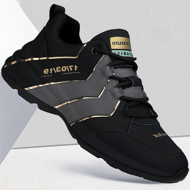 Scarpe da running uomo nere e bianche con lacci, suola ammortizzata per comfort e performance sportive.