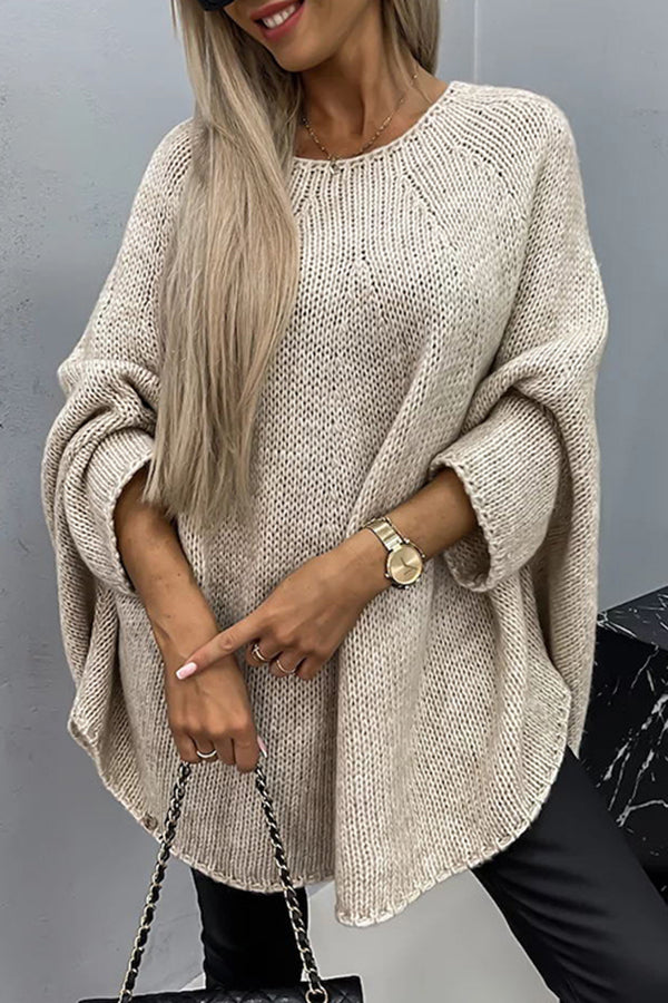 Elegante maglione donna oversize in maglia calda per l'inverno. Collo rotondo, maniche lunghe, perfetto per ogni occasione.