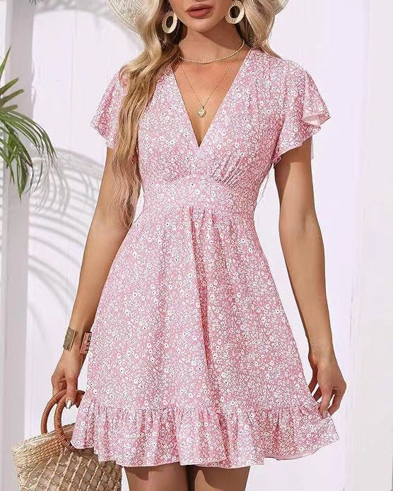 Abito corto donna floreale estivo, vita alta e maniche a volant, perfetto per un look fresco e alla moda.