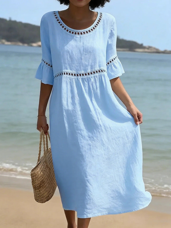 Vestito midi donna contenitivo, dal design elegante che modella la figura. Perfetto per un look femminile e raffinato.