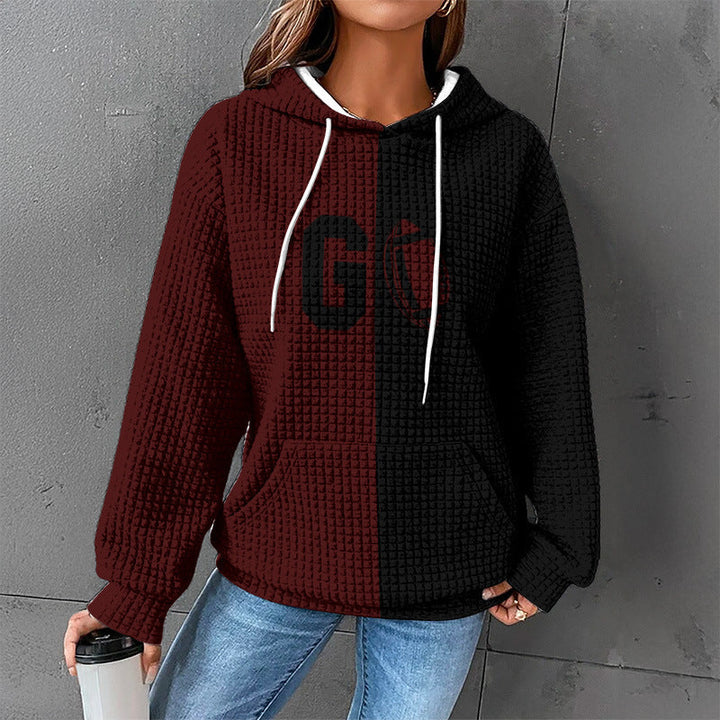 Maglione donna casual con cappuccio e tasca frontale, un pullover in maglia perfetto per l'inverno.