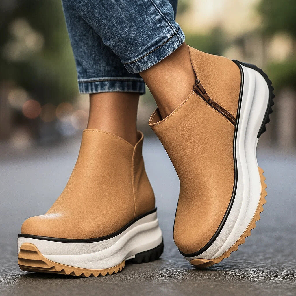 Look moderno con stivaletti platform donna neri, scarpe con zip per facile calzata, design di moda.