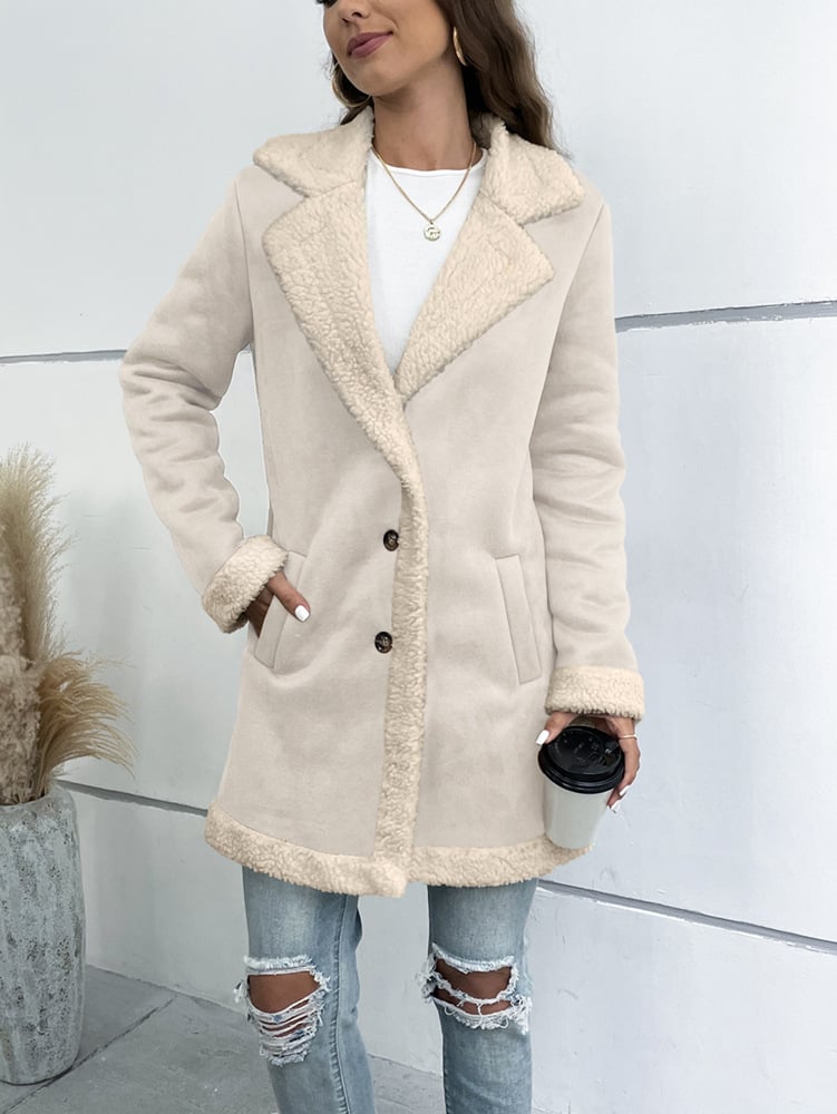Cappotto donna invernale lungo con colletto a revers, versatile per look casual ed elegante.