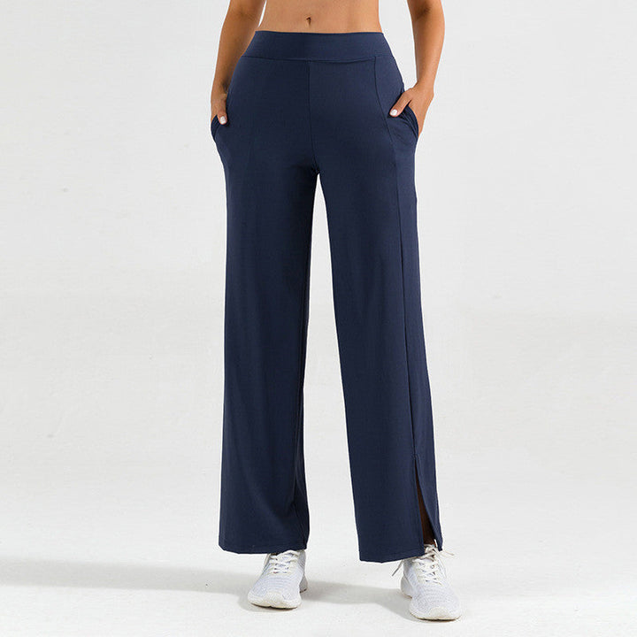 Abbigliamento yoga: pantaloni donna neri a gamba larga e spacco, perfetti per l'attività fisica.