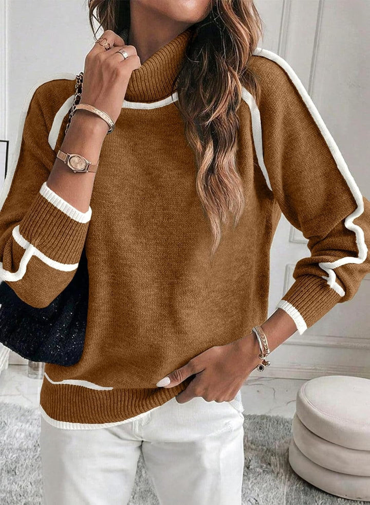 Pullover maglione da donna a collo alto, tinta unita. Maniche lunghe, un capo essenziale per abbigliamento femminile.