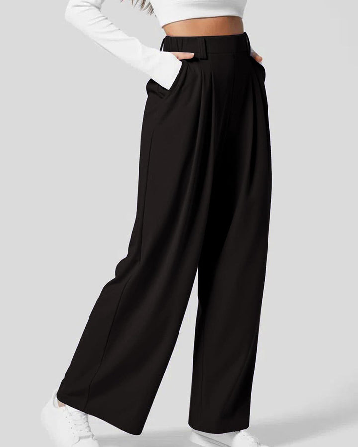 Pantaloni a gamba ampia donna in tessuto waffle, vita alta. Per un outfit elegante e confortevole, moda donna.