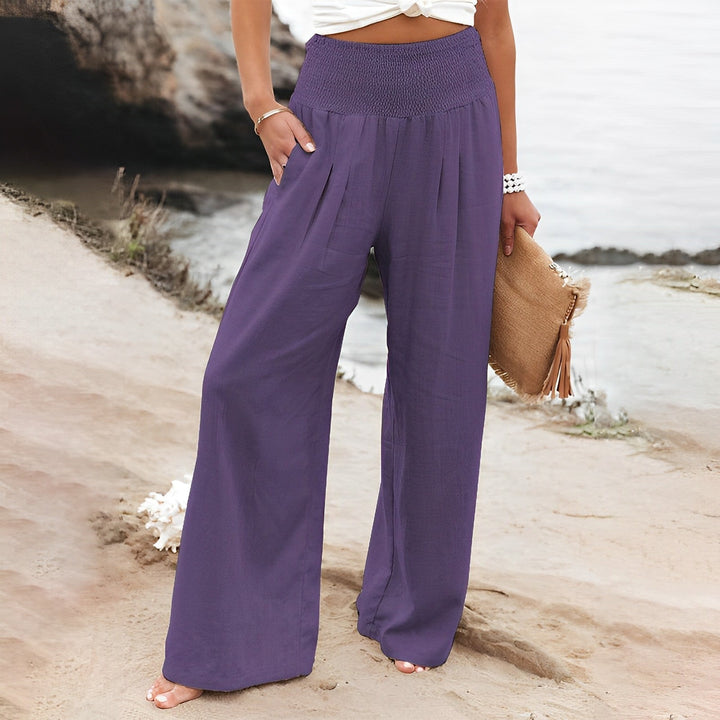 Pantaloni estivi palazzo da donna, a vita alta, che uniscono eleganza casual e massimo comfort.