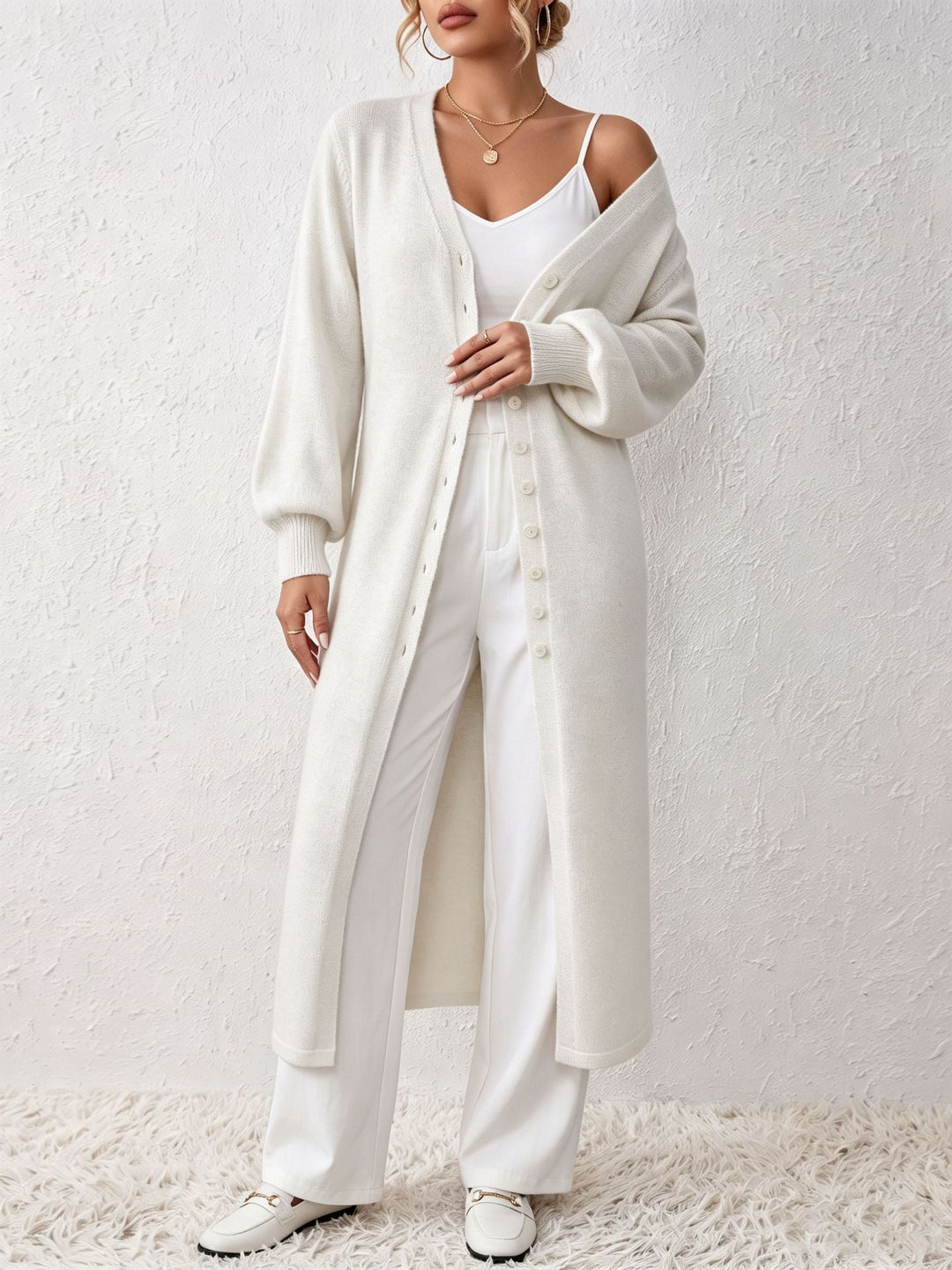 Cardigan lungo aperto da donna, elegante e morbido, ideale per look sofisticati e confortevoli.
