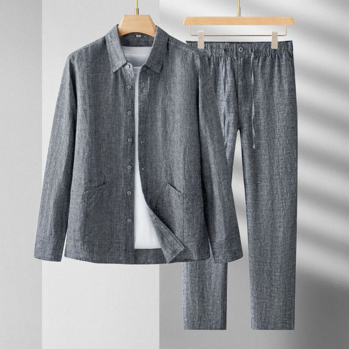 Elegante completo uomo due pezzi grigio a manica lunga, vestibilità regolare, perfetto per outfit lavoro o eventi.