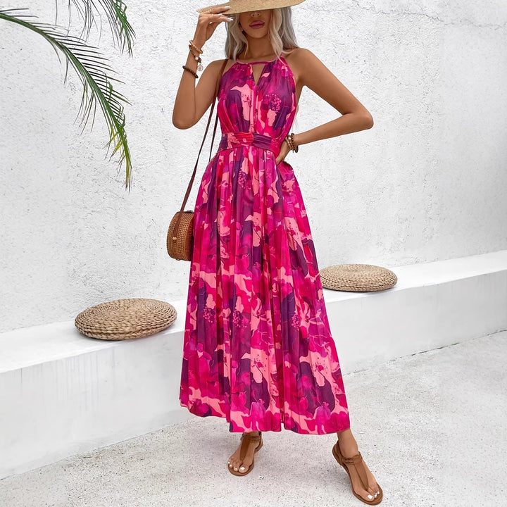 Vestito midi donna estivo a fantasia floreale, elegante e senza maniche, ideale per cerimonie o tempo libero.