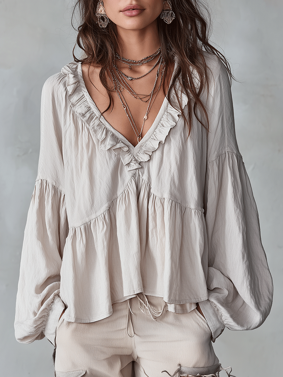 Blusa donna bohémien con volant, stile leggero e romantico.