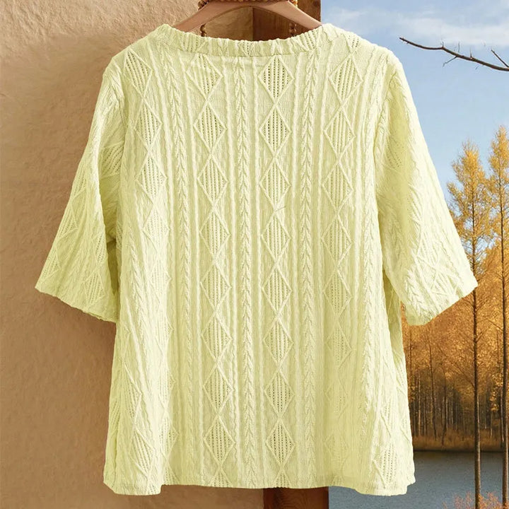 Cardigan estivo donna, traforato e leggero, maniche 3/4. Perfetto per serate fresche.