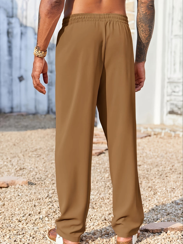 Vista frontale: Pantaloni uomo straight fit antipiega, design elegante e moderno per ogni stile e occasione.