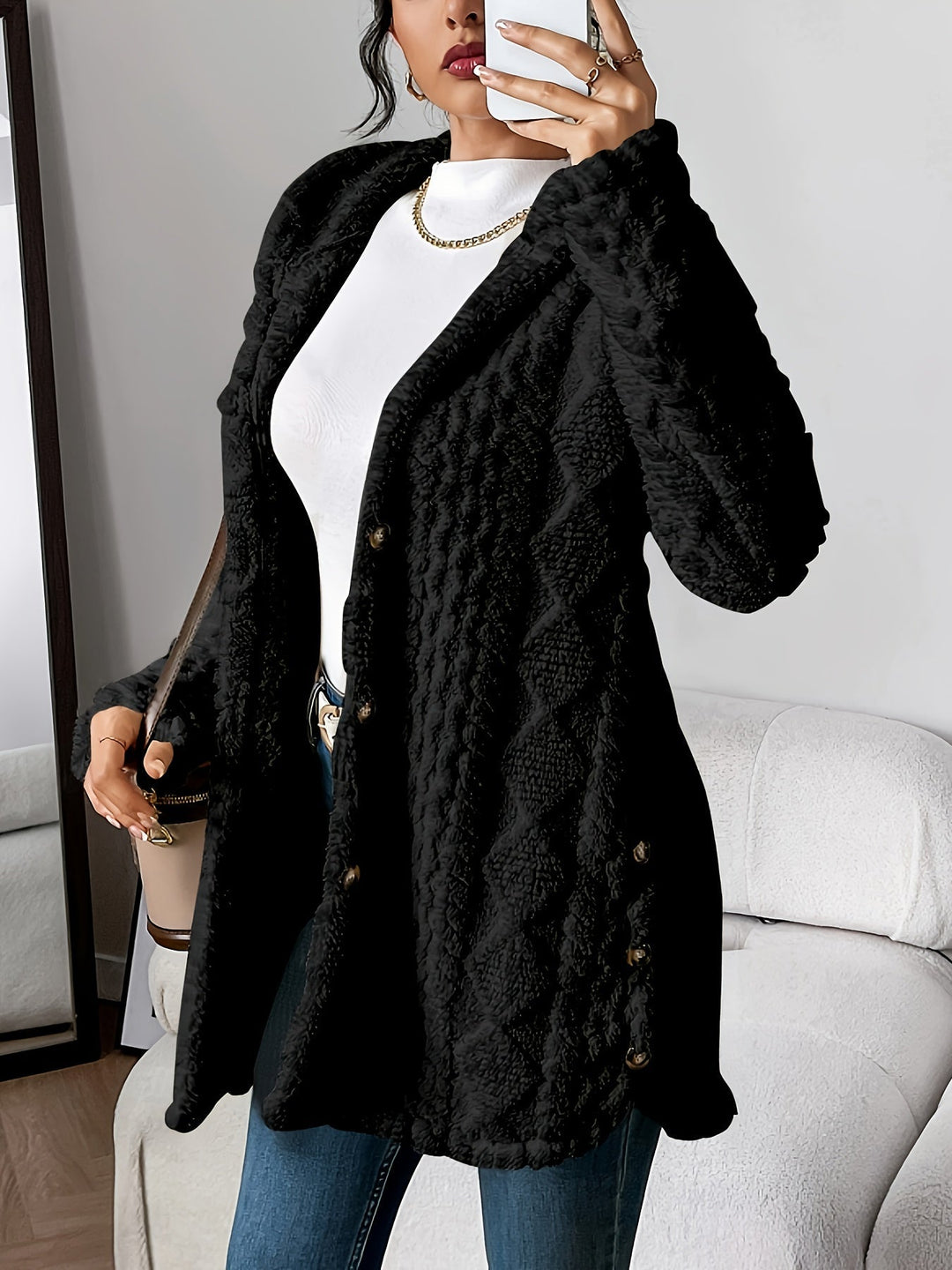 Morbido cardigan donna con cappuccio aperto, comodo per serate fresche e look casual versatili.