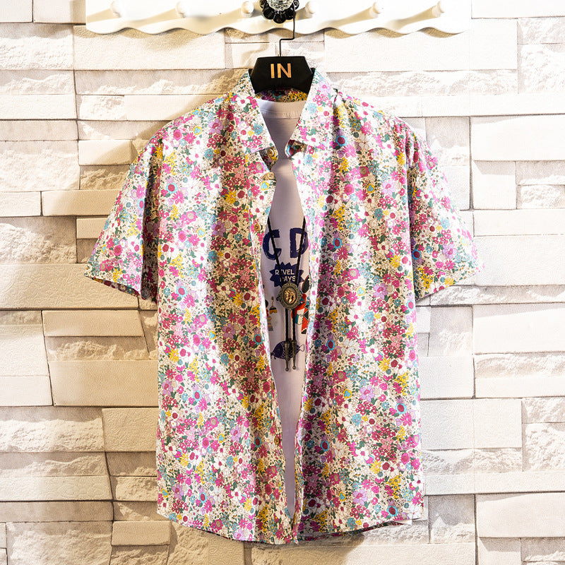 Camicia uomo slim fit a maniche corte con stampa floreale, perfetta per un look estivo casual.
