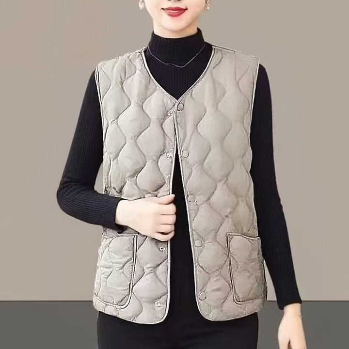 Top donna comodo e versatile, ideale come strato base sotto giacche o cardigan. Perfetto per la moda casual.